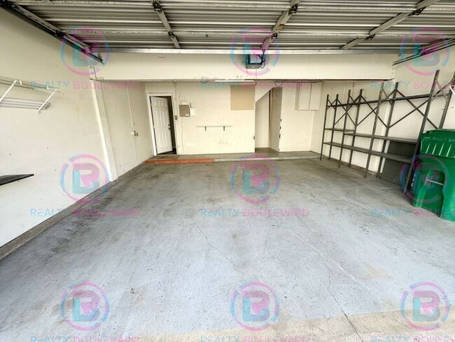 Building Photo - Contemporary 2-Bed Condo with Garage & Poo...