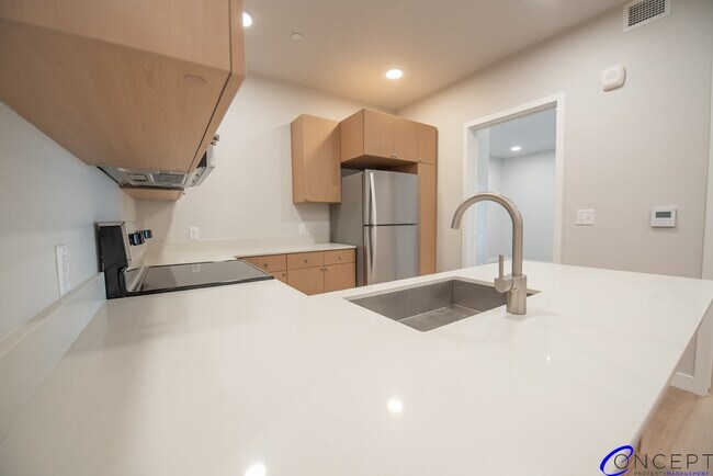 Building Photo - Brand-New Luxury Living with Mountain Char...