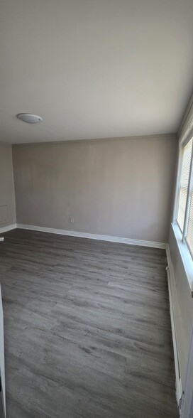 Unit #1 Living Room & Dining Room - 811 Stoll St