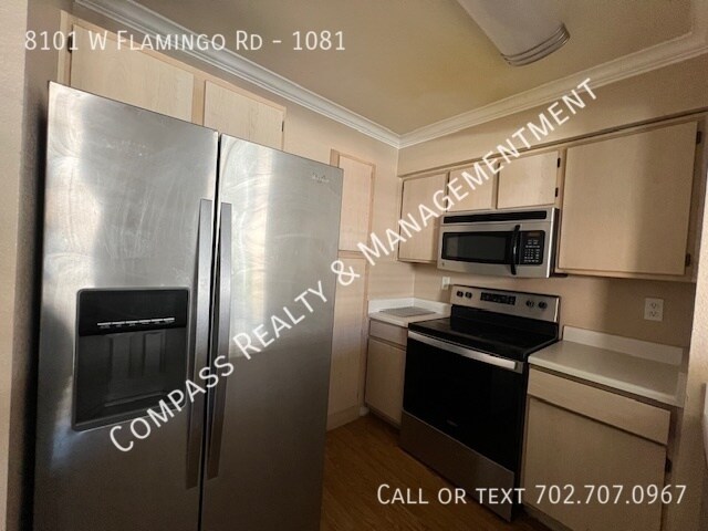 Building Photo - Welcome to your dream condo in this beauti...