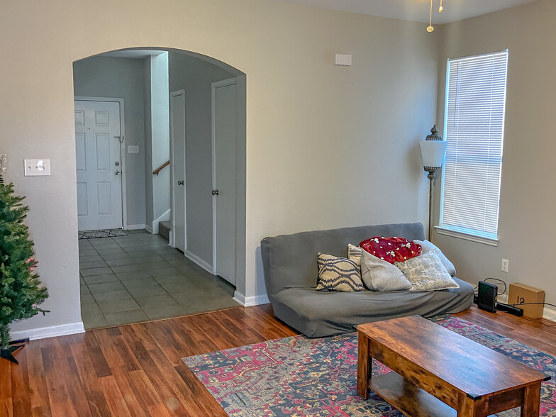 shared living area furnished by other roommates - 2929 McLaren Dr