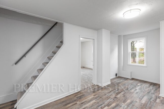 Building Photo - 3 Bed Home with Basement & Off-Street Parking – $1,395/mo