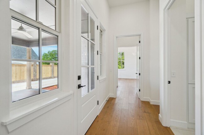 Building Photo - Classic Cape Cod Meets Modern Glam: Your D...
