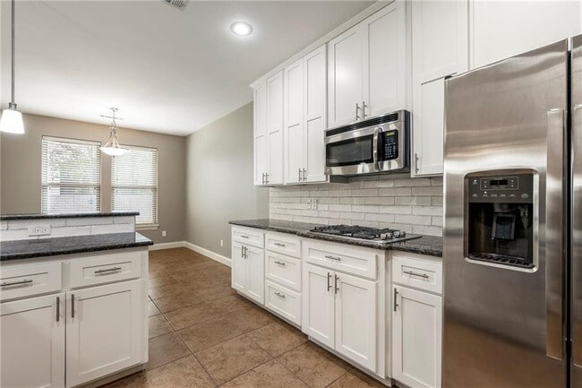 Building Photo - 4403 W Meadow Oaks Dr