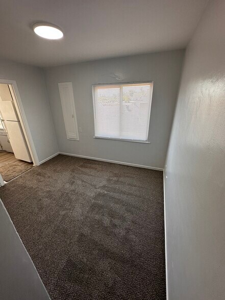 Dining room freshly painted and newly carpeted for a modern feel - 6333 MacArthur Blvd