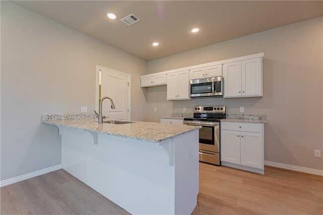 Building Photo - 1408 SW Casuarina Dr