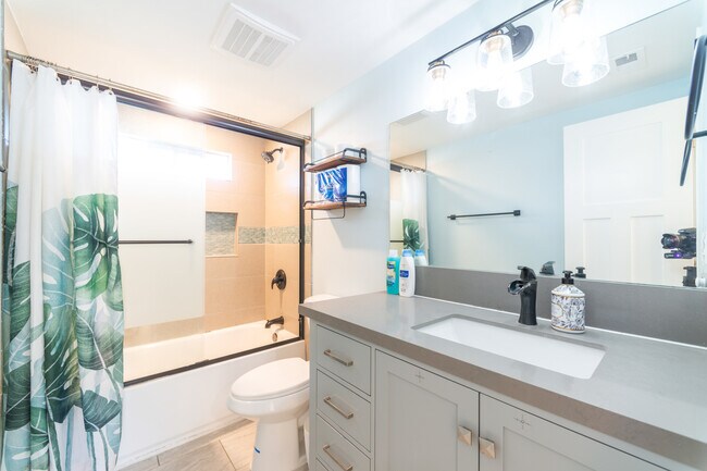 Our fully stocked bathrooms come with soap, shampoo, plush towels, and a hair dryer. - 9853 Saint George St