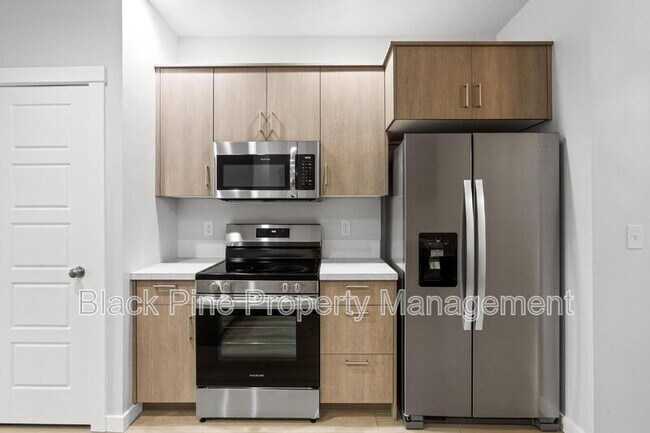 Building Photo - 895 N Aleppo Wy