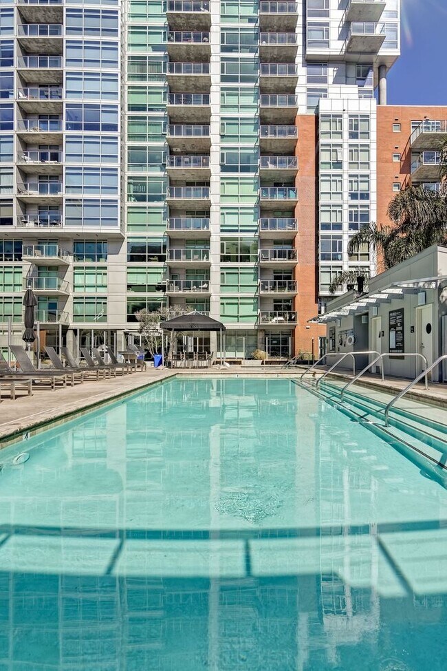 Building Photo - Modern Downtown Condo in Premier High-Rise...