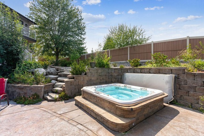 Building Photo - Stunning Home Along Spokane River Complete...