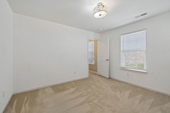 Building Photo - Charming and move-in ready 3-bedroom, 2.5-bath home