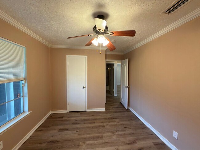Building Photo - Brand-new flooring throughout the entire home