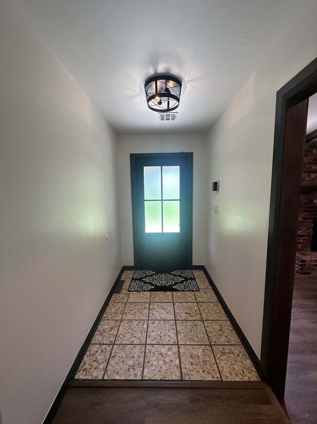 Building Photo - Welcome to country living with a fresh, modern twist.