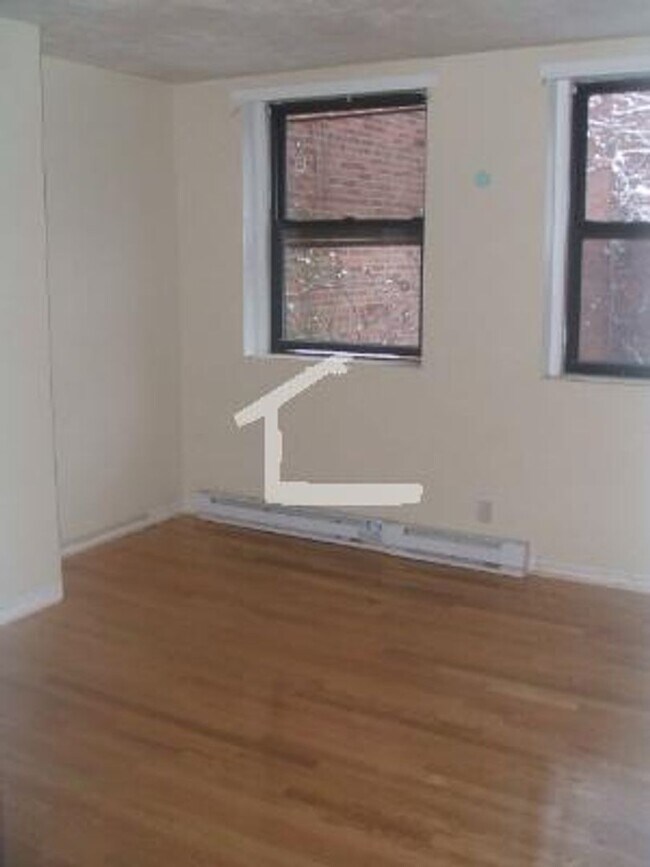 Building Photo - 20% off fee!  Right by T and BU!  Heat & H...