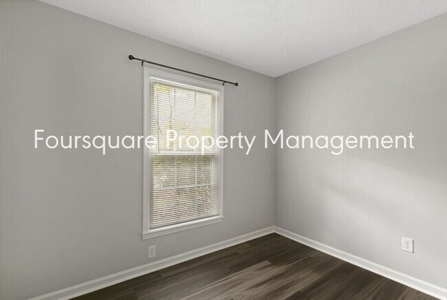Building Photo - Charming 1st-Floor End-Unit Condo with Gas Log Fireplace, Private Back Porch & Community Pool – T...