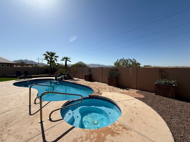 Building Photo - Gorgeous Furnished Pool/Spa Home with spectacular views