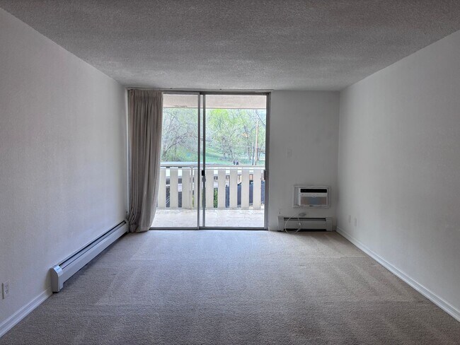 Building Photo - Available Now - 1 Bed 1 Bath Condo Home w/ Wall AC Unit - MileStone Real Estate Services