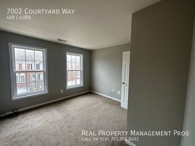 Building Photo - 7002 Courtyard Way