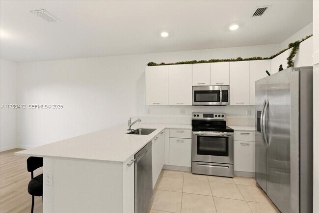 Building Photo - 12855 NW 24th Ave