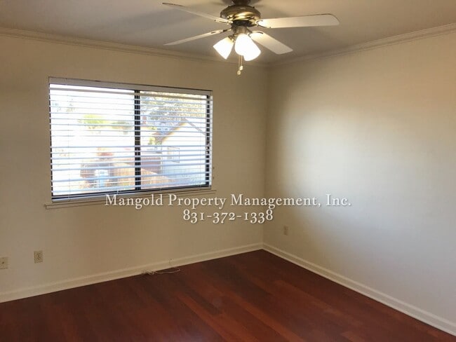 Building Photo - Charming Two-Story 2-Bed 2-Bath Home with Wrap-Around Balcony & Hardwood Floors in Seaside