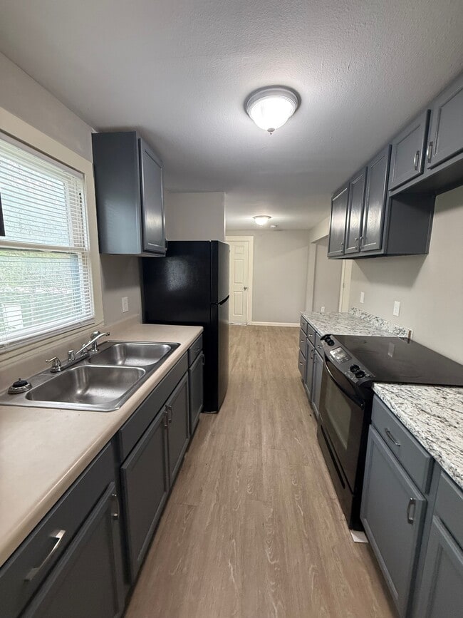 Building Photo - 130 OliveUnit 201B