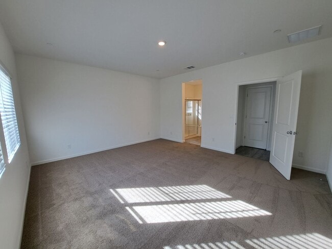 Building Photo - This Smart Home in Dixon is Luxurious with...