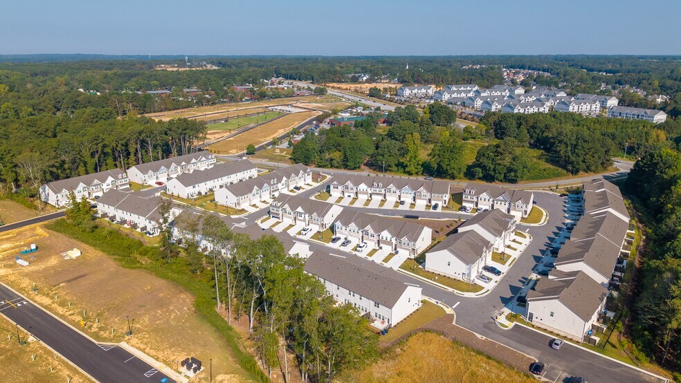 Birds-eye view showcasing the full layout of the community. - Carlton Crossing