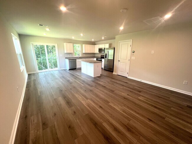 Building Photo - New Three-Bedroom, Two and one-half Bath T...