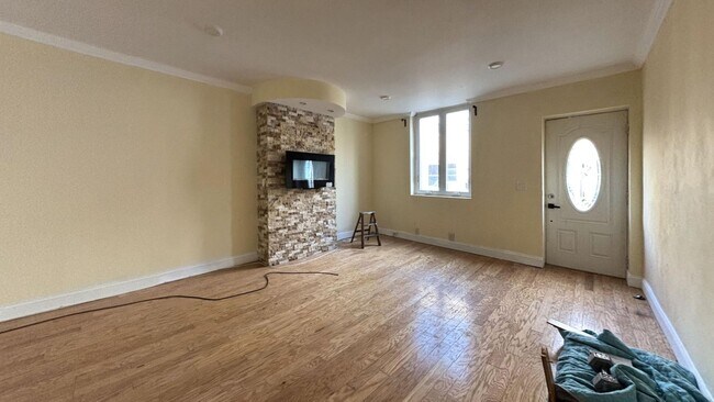 Building Photo - Philadelphia Rental with Modern Finishes and Stone Accent Wall.