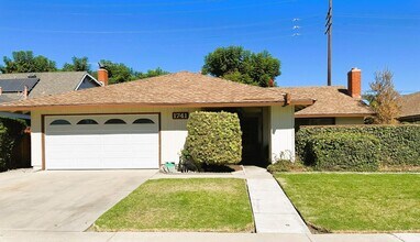 Building Photo - Spacious and Well Maintained 4 Bedroom Hom...