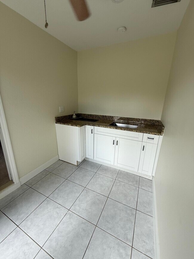 Building Photo - 6388 Whispering Wind Way