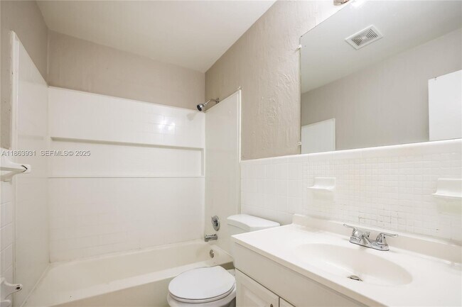 Building Photo - 5801 Royal Palm Blvd