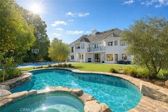 Building Photo - 5946 Woodlake Ave