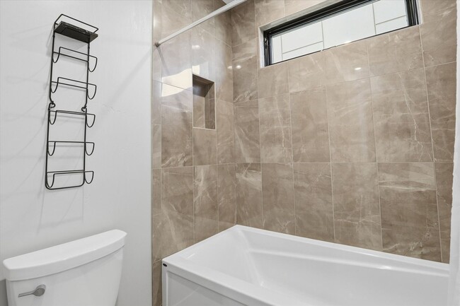 Building Photo - Modern 5-Bed Home in Atlas Waterfront — Elevator, Luxury Finishes & Prime Location