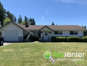 Building Photo - Renovated Rambler in Steilacoom Oasis