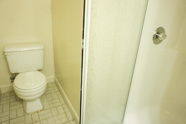 Building Photo - Beautiful brick townhome featuring three f...