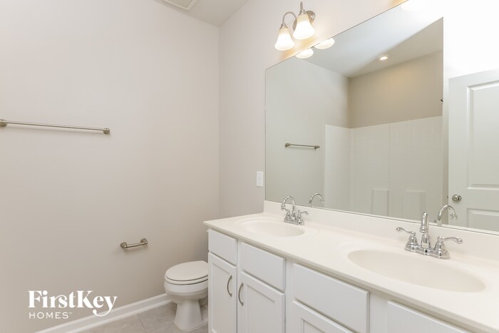 Building Photo - 304 Whispering Wind Way