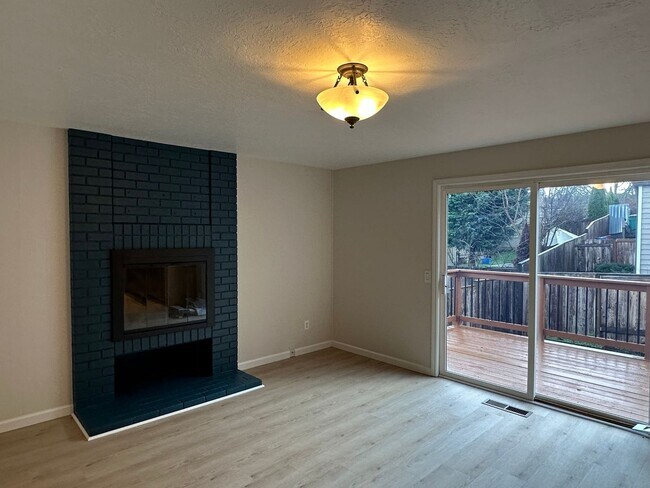 Building Photo - Beautiful 4BD Home | Fireplace, Fenced Backyard, Deck, Garage & A/C