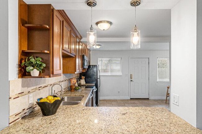 Building Photo - Beautiful Open Concept Brick Ranch blocks ...