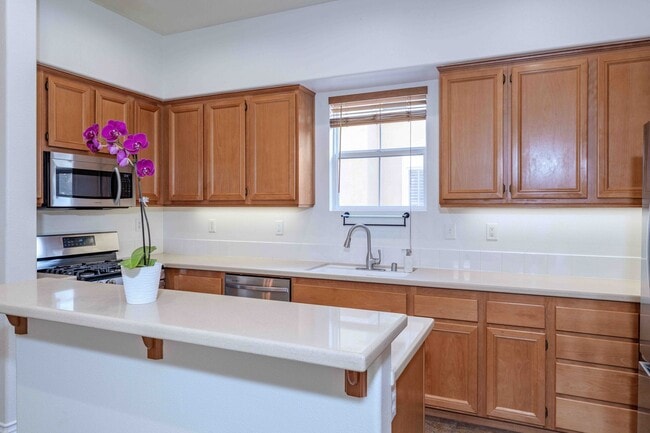 Building Photo - Stunning Upgraded Tri-Level Condo in South Coast Metro’s Exclusive Vantage Community