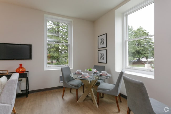 Spacious,Open Dining Area with XLarge Windows - Mercy Magnuson Place (Income Restricted)