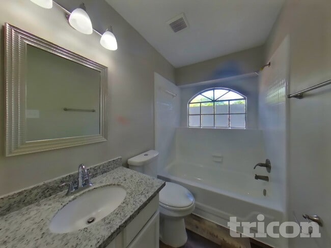 Building Photo - 7114 River Garden Dr