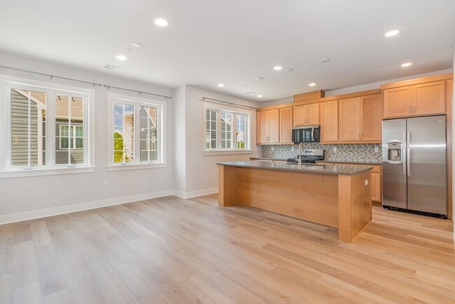 Building Photo - Modern 2025 Townhome | Open-Concept Living, Chef’s Kitchen with Large Island & 2-Car Garage