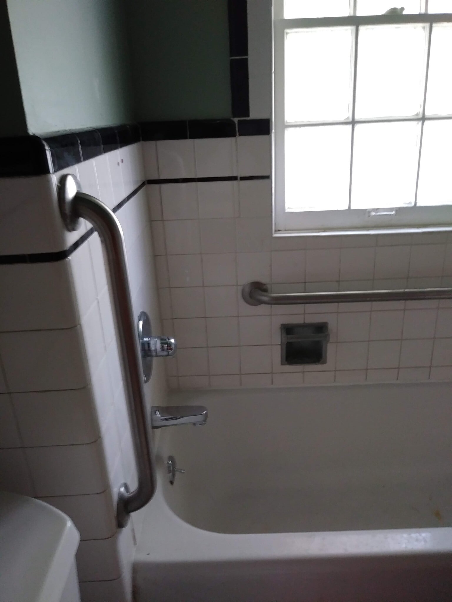 Bathroom tub first floor with safety rails - 2120 Allston Ave