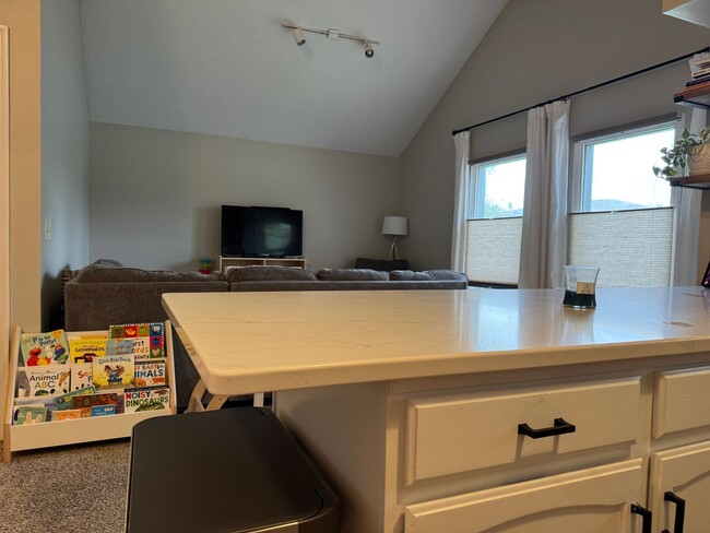 Building Photo - Spacious Corner Townhome with Private Yard...