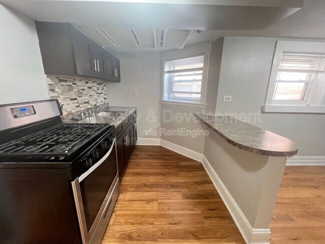 Building Photo - 5410 W Berteau Ave