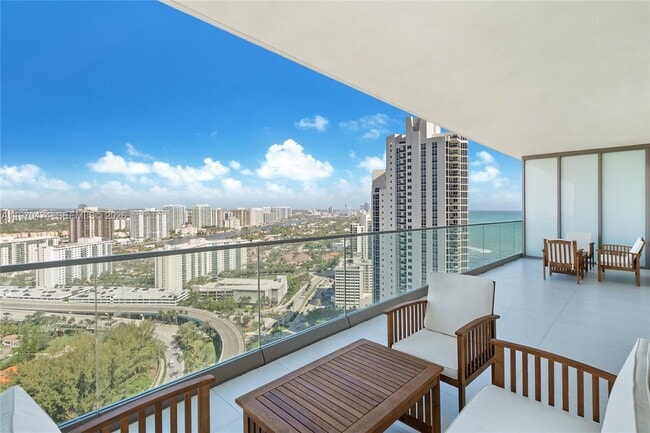 Building Photo - 18975 Collins Ave