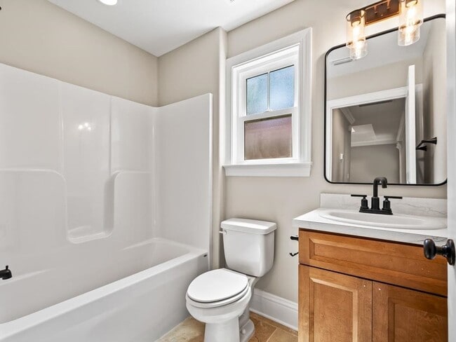 Building Photo - Your Family’s New Happy Place Available Today