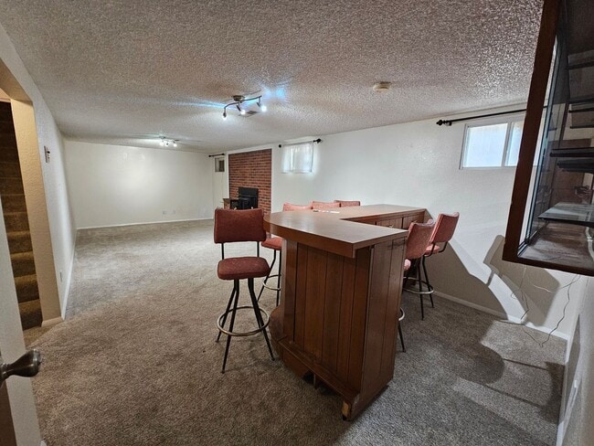 Building Photo - 4-Bedroom Home with In-Ground Pool, Solar ...