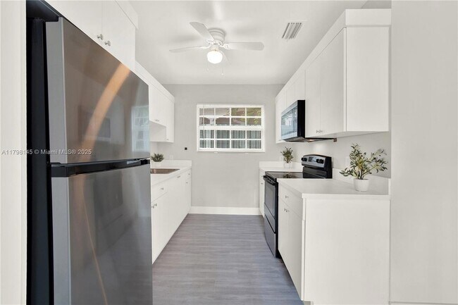 Building Photo - 10410 NW 28th Ave